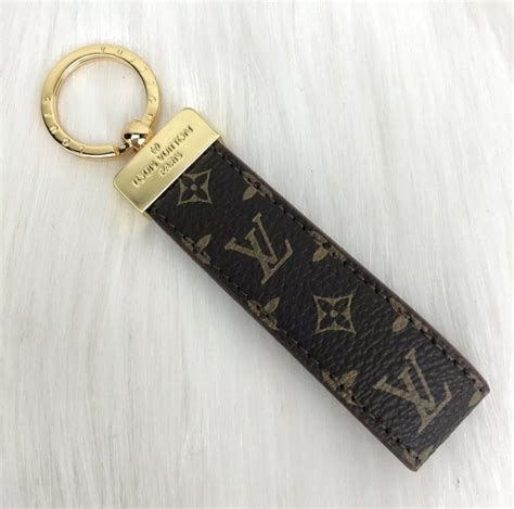 louis vuitton bag charm key holder lv|authentic louis vuitton key pouch.